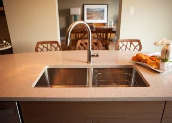 Custom kitchen with island, Quartz top, stainless under mount sink and faucet