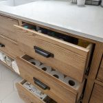 closeup of ash vanity with drawers partial open